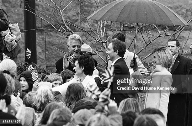 President Bill Clinton greets the crowd with British Prime Minister Tony Blair and First Lady Hillary Clinton at the FDR memorial on February 6, 1998.