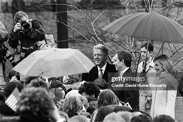 President Bill Clinton greets the crowd with British Prime Minister Tony Blair and First Lady Hillary Clinton at the FDR memorial on February 6, 1998.