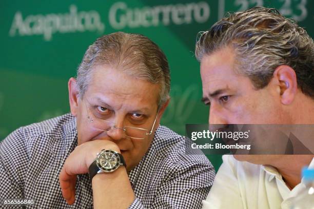 Luis Robles Miaja, chairman of BBVA Bancomer SA and president of the Mexican Banking Association , left, speaks with Ernesto Torres Cantu, chief...