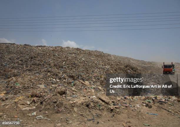 Truck in Koshe rubbish dump, Addis Ababa region, Addis Ababa, Ethiopia on March 13, 2017 in Addis Ababa, Ethiopia.