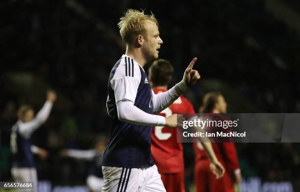 Steven Naismith of Scotland celebrates after he scores during the International Challenge Match between Scotland and Canada at Easter Road on March...