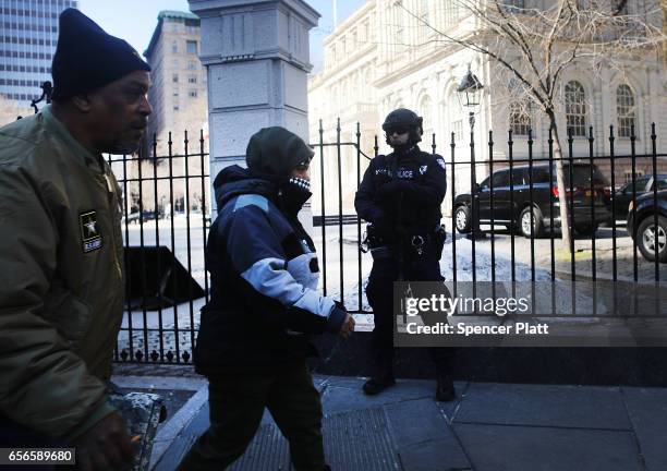 New York City counter terrorism police patrol in lower Manhattan following a terrorist attack in London on March 22, 2017 in New York City. Extra...