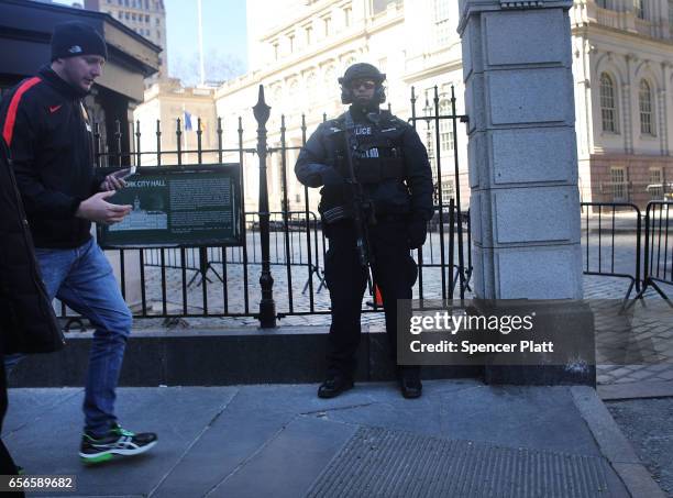 New York City counter terrorism police patrol in lower Manhattan following a terrorist attack in London on March 22, 2017 in New York City. Extra...