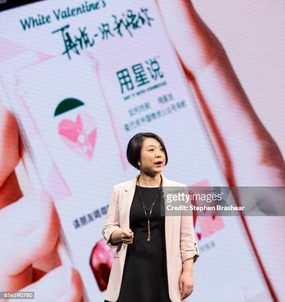 Starbucks China Vice President of Digital Ventures Molly Liu speaks during Starbucks annual meeting of shareholders on March 22, 2017 in Seattle,...