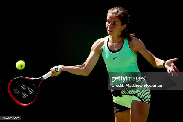 Annika Beck of Germany returns a shot to Christina McHale during the Miami Open at the Crandon Park Tennis Center on March 22, 2017 in Key Biscayne,...