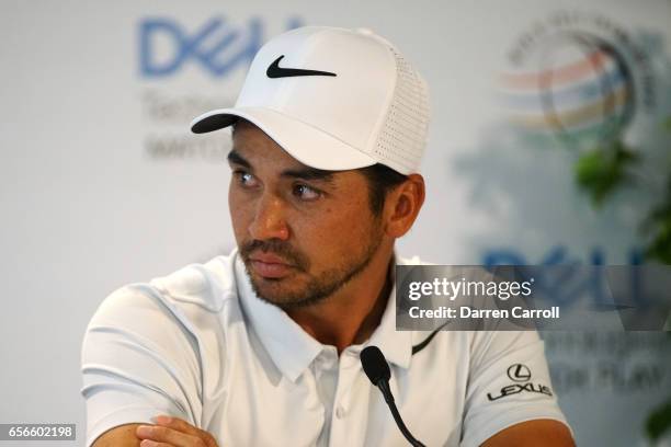 Jason Day of Australia addresses the media during a press conference after withdrawing due to an illness in the family from round one of the World...