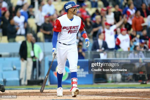 Puerto Rico's Carlos Correa reacts after hitting a home run in the first inning during the game against the Netherlands on March 20 at Dodger Stadium...
