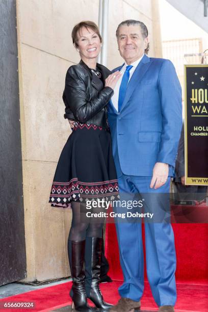 Cheryl and Haim Saban at the ceremony to honor Haim Saban with a star on The Hollywood Walk of Fame on March 22, 2017 in Hollywood, California.