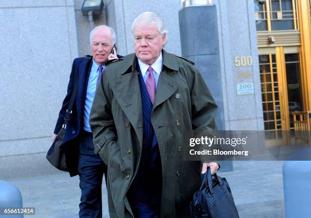 Tom Davis, former chief executive officer of Dean Foods Co., right, exits federal court in New York, U.S., on Wednesday, March 22, 2017. Davis is...