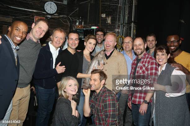 Jesse Tyler Ferguson and husband Justin Mikita pose backstage with the cast of the hit musical "Come From Away" on Broadway at The Schoenfeld Theatre...