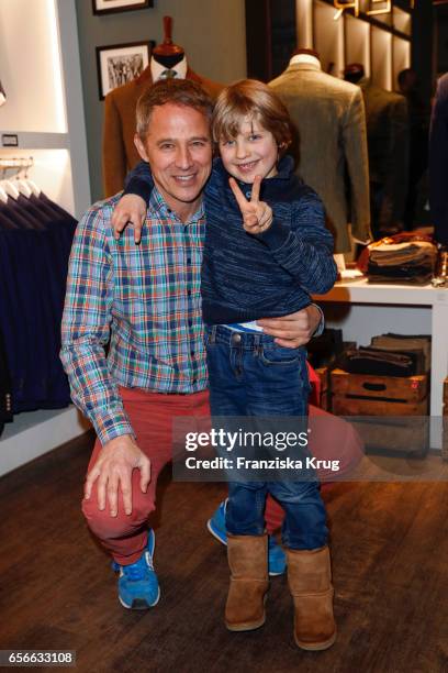 Andreas Brucker and his son Noah Heinrich attend the Anton Meyer store opening on March 22, 2017 in Hamburg, Germany.