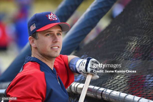 Catcher Buster Posey of team United States smiles during batting practice before taking on team Puerto Rico during Game 3 of the Championship Round...