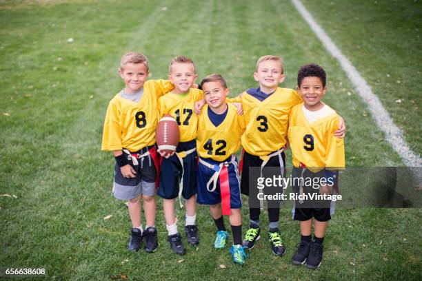young flag football team team picture - flag football stock pictures, royalty-free photos & images