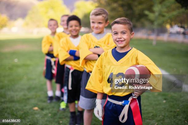 young male flag football team - amateur sport stock pictures, royalty-free photos & images