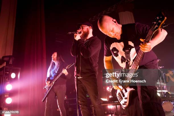 Niclas Engelin, Anders Friden and Hakan Skoger of the Swedish band In Flames perform live during a concert at the Admiralspalast on March 22, 2017 in...