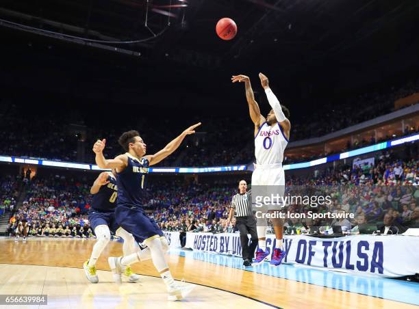 Kansas Jayhawks Guard Frank Mason III takes a three point shot during the Kansas Jayhawks game versus the UC Davis Aggies in the first round of the...