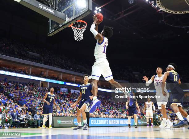 Kansas Jayhawks Guard Josh Jackson takes the lob pass from Kansas Jayhawks Guard Frank Mason III and converts for the score during the Kansas...