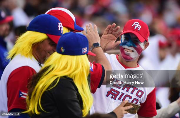 Fans for team Puerto Rico are seen before the game against team United States during Game 3 of the Championship Round of the 2017 World Baseball...