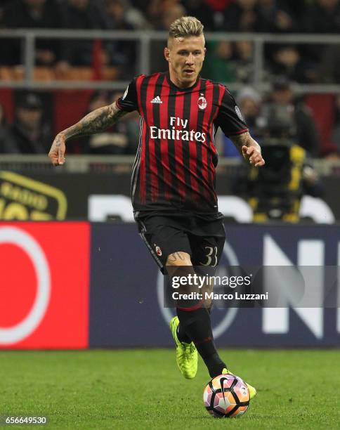 Juraj Kucka of AC Milan in action during the Serie A match between AC Milan and Genoa CFC at Stadio Giuseppe Meazza on March 18, 2017 in Milan, Italy.