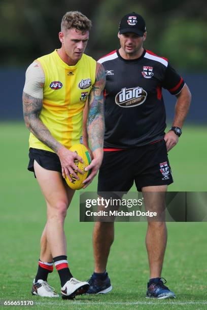 Assistant coach Aaron Hamill speaks to Tim Membrey of the Saints who lines up for goal during a St Kilda Saints AFL training session at Linen House...