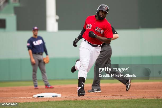 Jackie Bradley Jr. #15 of the Boston Red Sox hits a home run during the spring Training game against the Team USA at Jet Blu Park on March 09, 2017...