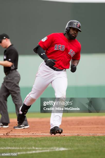 Jackie Bradley Jr. #15 of the Boston Red Sox hits a home run during the spring Training game against the Team USA at Jet Blu Park on March 09, 2017...