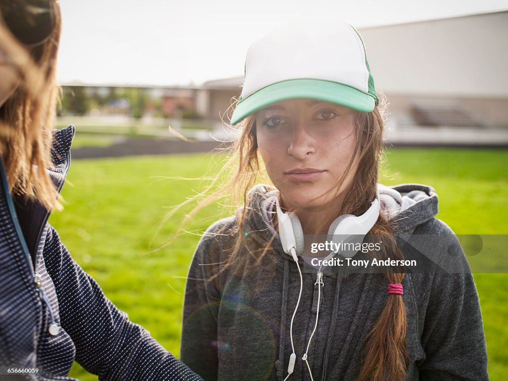 Young women athletes on school playing field