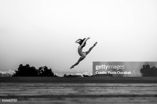 female ballet dancer dancing in lyon, france - urban ballet imagens e fotografias de stock