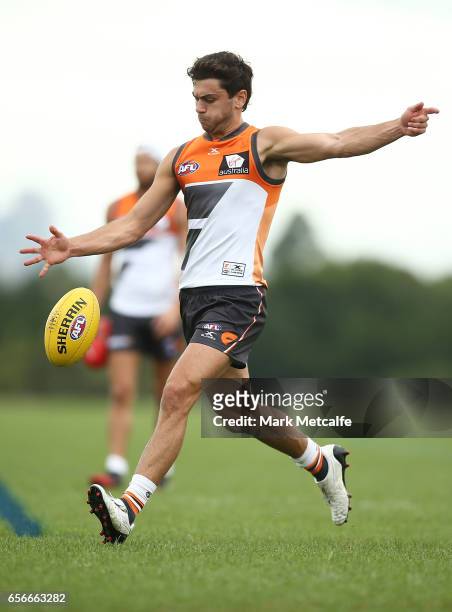 TIm Taranto of the Giants kicks during the Greater Western Sydney Giants AFL training session at WestConnex Centre on March 23, 2017 in Sydney,...