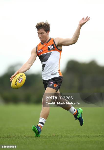 Toby Greene of the Giants kicks during the Greater Western Sydney Giants AFL training session at WestConnex Centre on March 23, 2017 in Sydney,...