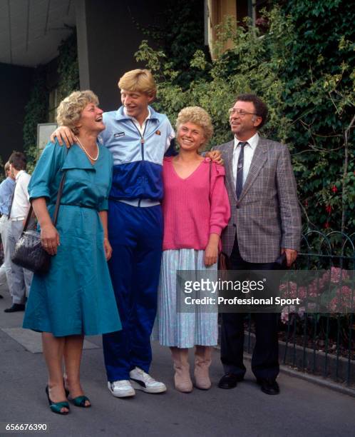 Boris Becker of West Germany surrounded by his family after defeating Kevin Curren of the USA during the men's singles final at Wimbledon on 7th July...