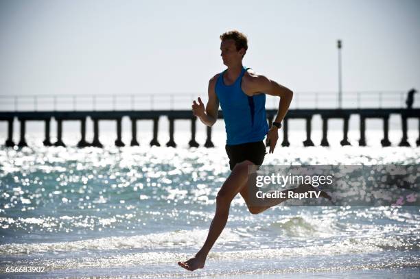 man running on beach barefoot - pier 84 stock pictures, royalty-free photos & images