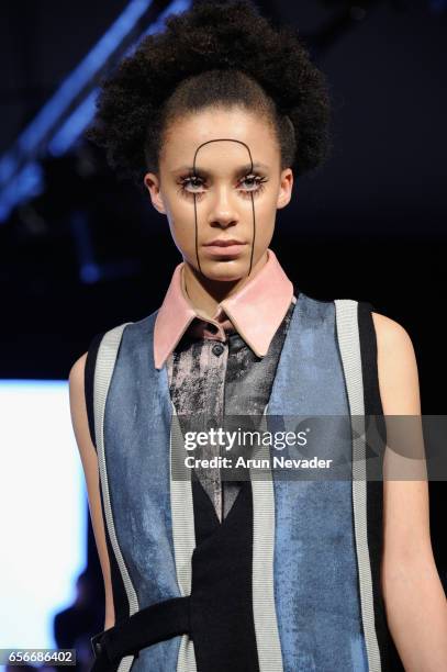 Model walks the runway wearing Hangjun Jo at Vancouver Fashion Week Fall/Winter 2017 at Chinese Cultural Centre of Greater Vancouver on March 22,...