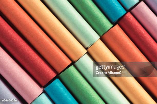 colorful paper rolls - roll of wrapping paper stock pictures, royalty-free photos & images