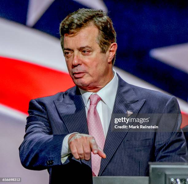 American political lobbyits and Trump campaign manager Paul Manafort points during a microphone sound check on the main stage of the Quicken Arena,...