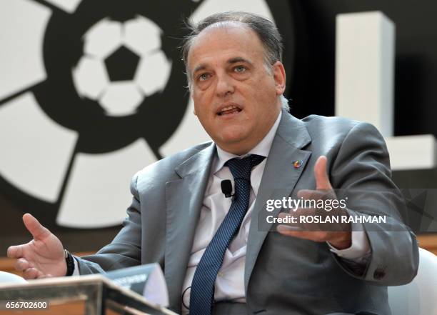 Javier Tebas, president of La Liga speaks during the official launch of Spanish Football League La Liga office in Singapore on March 23, 2017. / AFP...