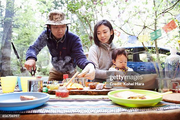 family camping in the mountain - surface preparation stock pictures, royalty-free photos & images