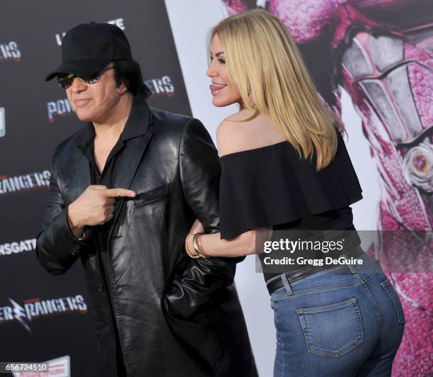 Gene Simmons and Shannon Tweed arrive at the premiere of Lionsgate's "Power Rangers" at The Village Theatre on March 22, 2017 in Westwood, California.