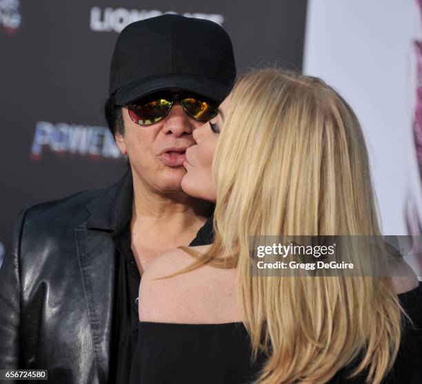 Gene Simmons and Shannon Tweed arrive at the premiere of Lionsgate's "Power Rangers" at The Village Theatre on March 22, 2017 in Westwood, California.