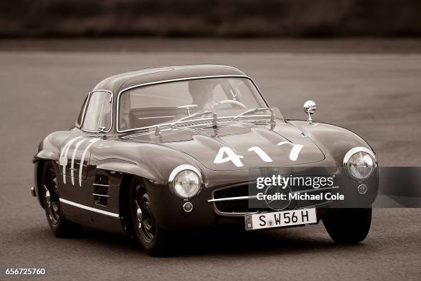 Historic Mercedes Benz 300SL 'Gullwing' , parading around the circuit during the 75th Member's Meeting at Goodwood on March 18, 2017 in Chichester,...