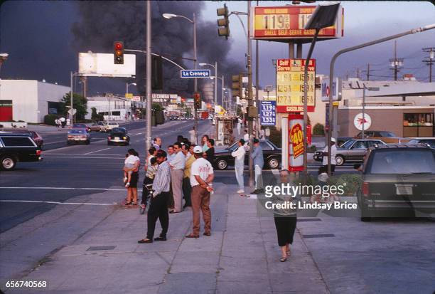 Rodney King Riot. A view of intersection of La Cienega and Pico Boulevards during the Rodney King Riots showing citizens going about their day barely...