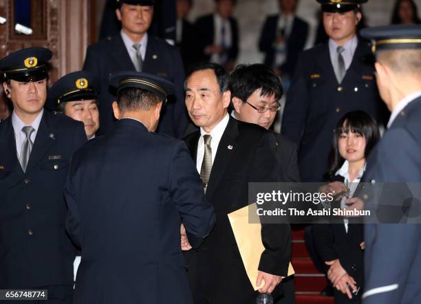 Head director of school operator 'Moritomo Gakuen' Yasunori Kagoike leaves after an upper house budget committee at the diet building on March 23,...