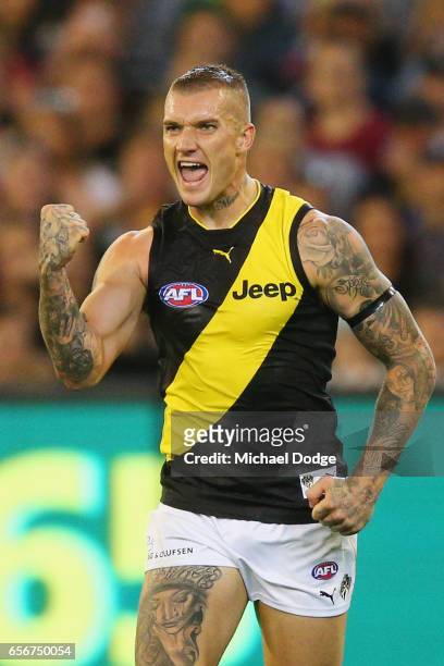 Dustin Martin of the Tigers celebrates a goal during the round one AFL match between the Carlton Blues and the Richmond Tigers at Melbourne Cricket...