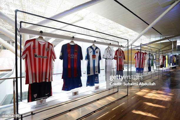 Spanish club football jerseys on display during the launch of LaLiga at the Supreme Court Terrace, National Gallery Singapore on March 23, 2017 in...