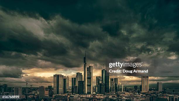 frankfurt skyline under storym skies - frankfurt germany stock pictures, royalty-free photos & images