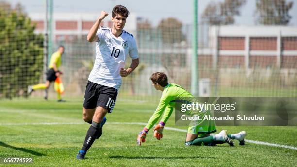 Elias Abouchabaka of Germany celebrates the fourth goal of his team during the UEFA U17 elite round match between Germany and Armenia on March 23,...