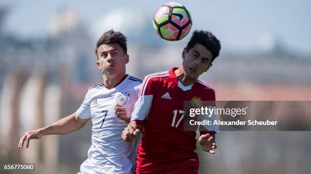 Nicolas-Gerrit Kuehn of Germany challenges Aram Khamoyan of Armenia during the UEFA U17 elite round match between Germany and Armenia on March 23,...