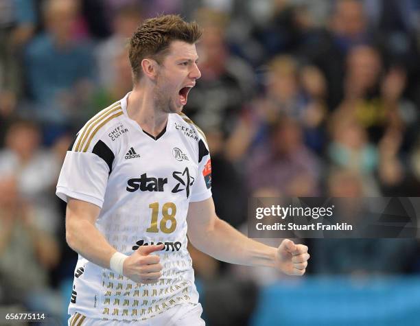 Niclas Ekberg of Kiel celebrates during the first leg round of 16 EHF Champions League match between THW Kiel and Rhein Neckar Loewen at Sparkassen...