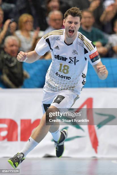 Niclas Ekberg of Kiel celebrates during the first leg round of 16 EHF Champions League match between THW Kiel and Rhein Neckar Loewen at Sparkassen...