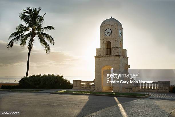clock tower at worth avenue, palm beach, - palm beach florida stock pictures, royalty-free photos & images